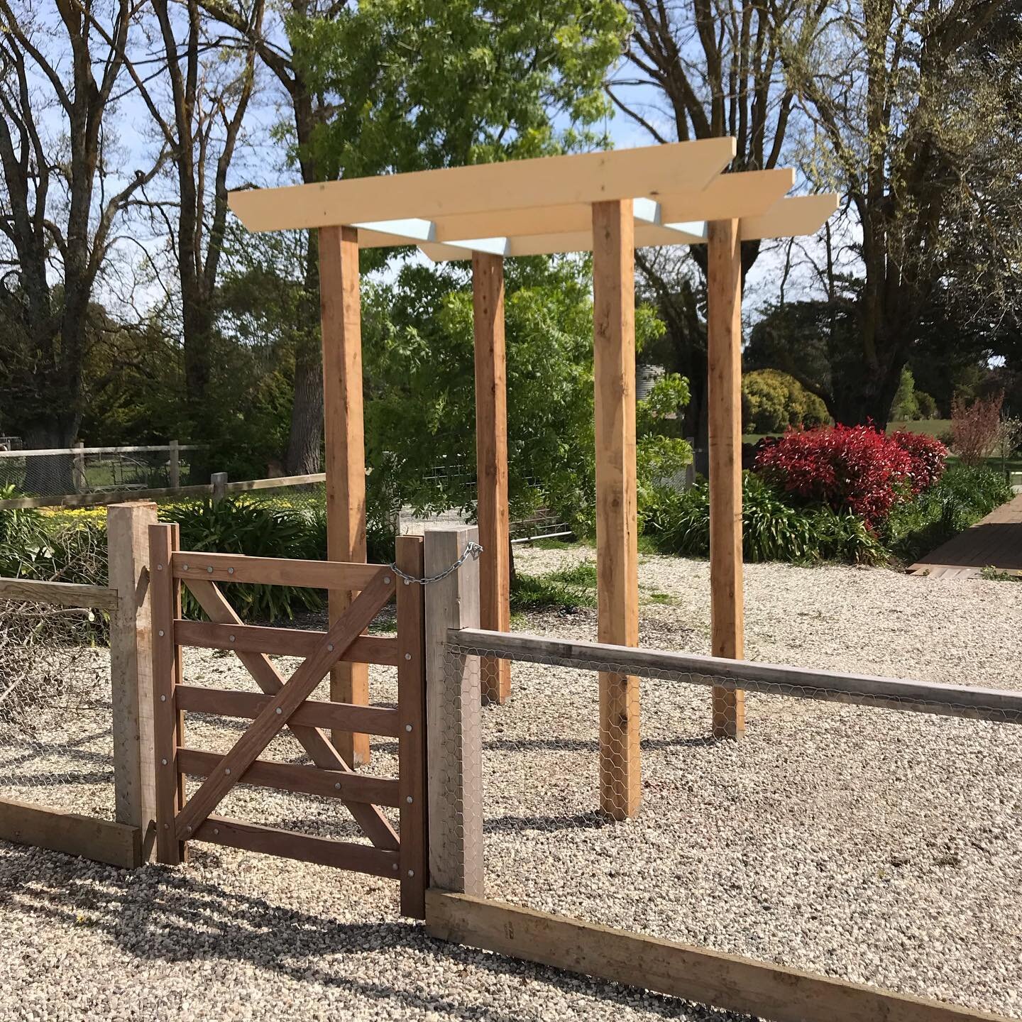 GARDEN ARBOR🔨 

A new cypress arbor sets off a spotted gum pedestrian gate and gal netting fence, which will grey off to bring a lovely vintage farmhouse patina.
#kynetonfencing #qualityanddetail