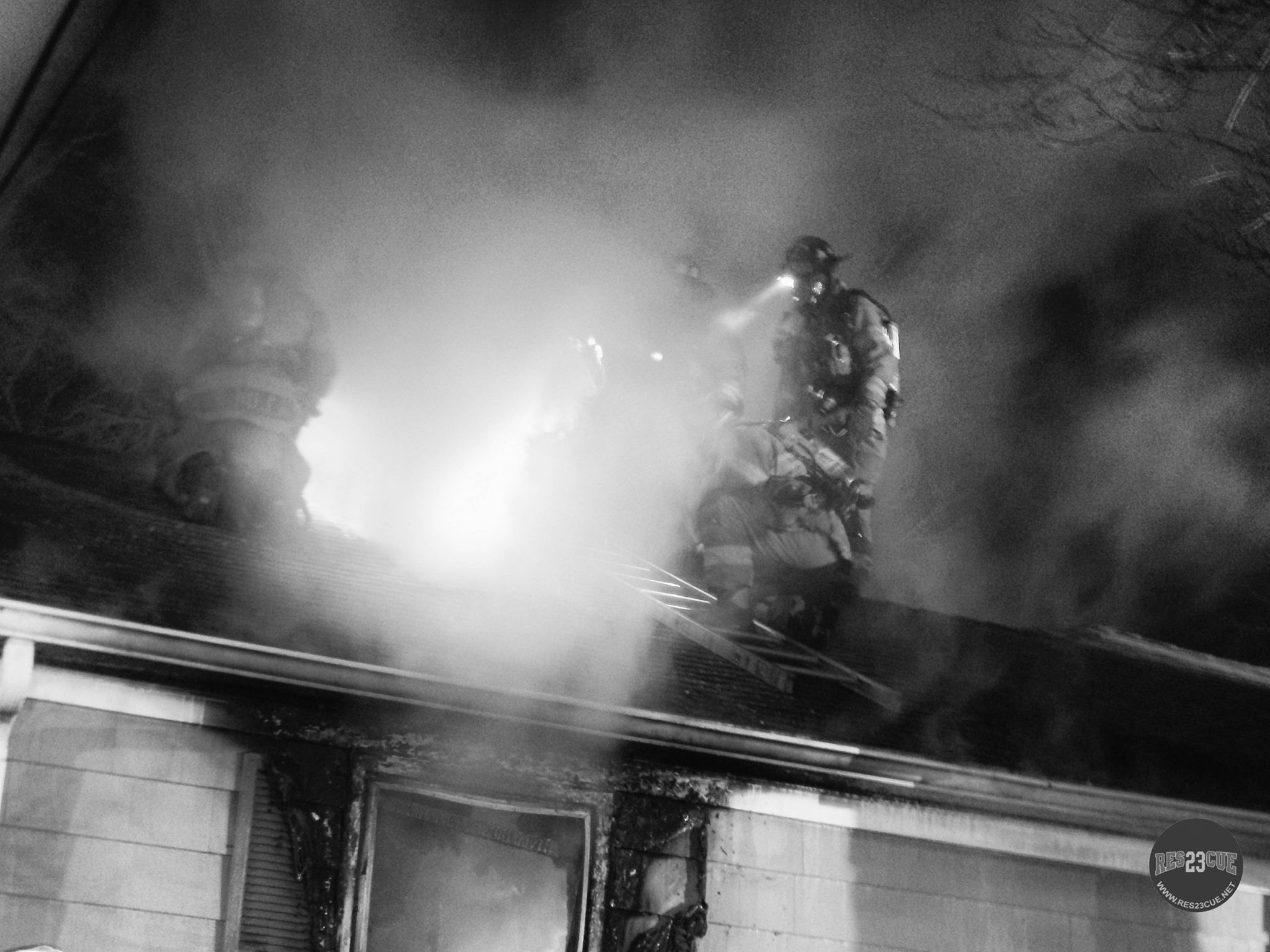 11/18/2015 362 Brimfield Road - House Fire Firefighters ventilating the roof on the A side of the structure