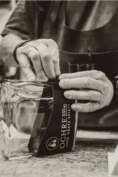 Ochre-Bottle-Hands.jpg