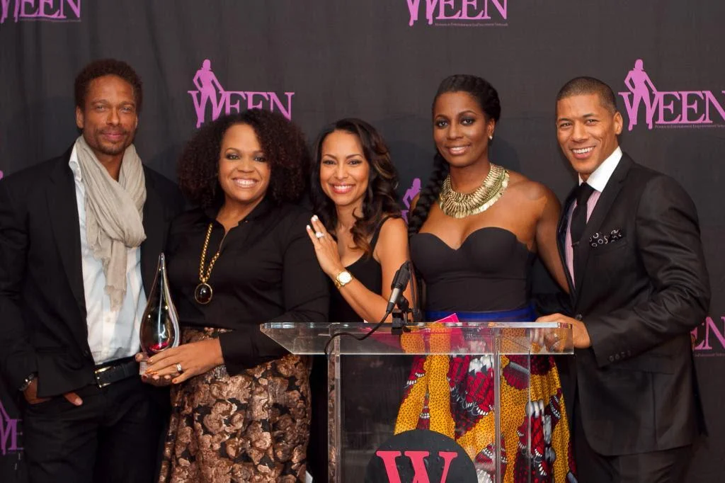 Gary Dourdan presents Lisa Price with the WEEN Award along with WEEN co-founder Valeisha Butterfield-Jones, Sabrina Thompson and Shannon Lanier last night at New York's Helen Mills event space