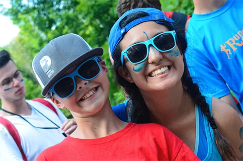  Camper James smiles with counsellor Claire during a theme-day competition at Camp Banting in Ontario. SUPPLIED 