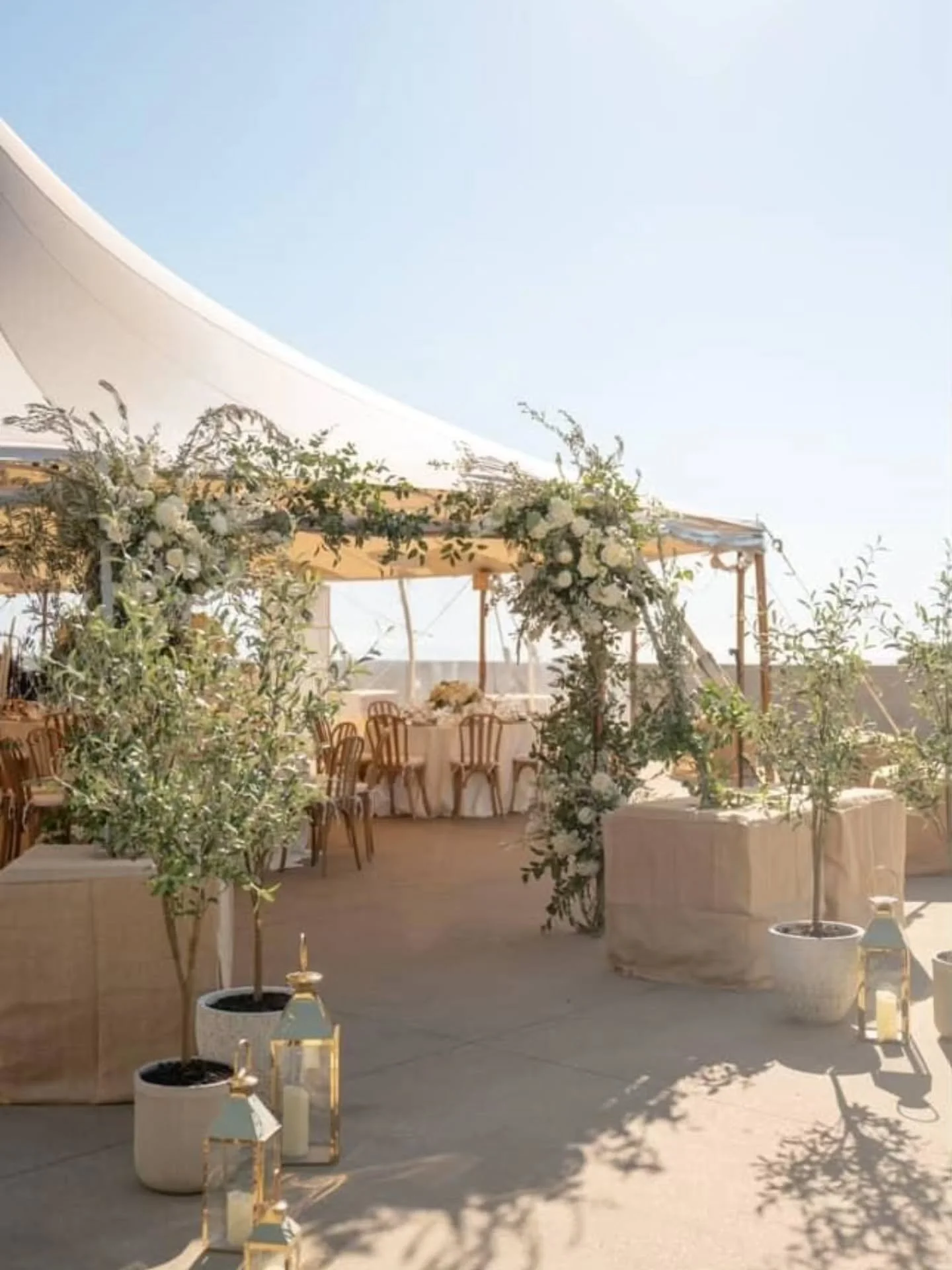 Garden style tent entryway done right by @greenpetaldesigns 

Photography @ginapetersenphotography 
Tent @zephyrtents 
Rentals @standardeventrentals 

Wedding Planner