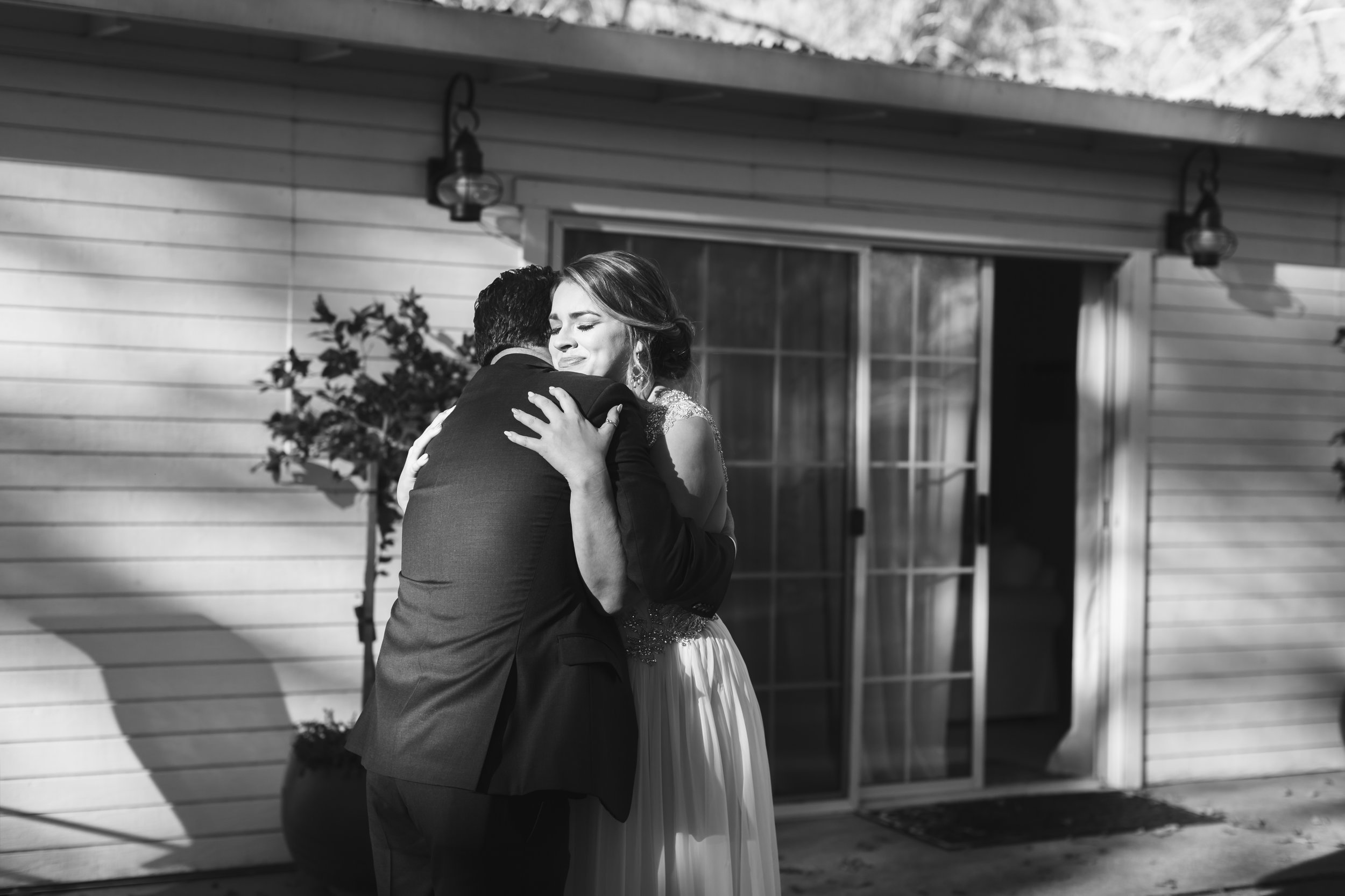 Madison shares a moment with her father before he walks her down the aisle.