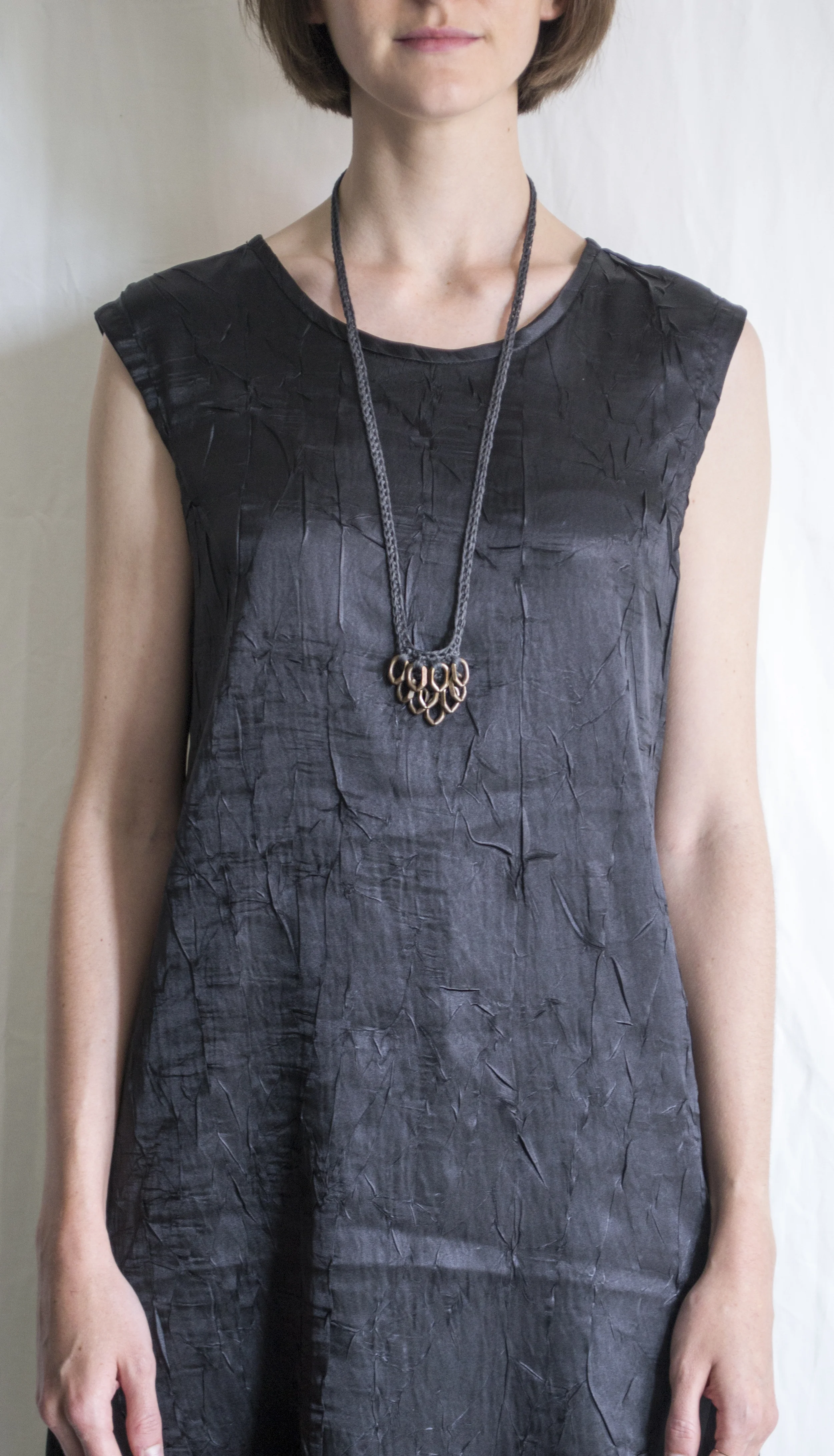 BlackDress-DKGreyGrommetNecklace1.jpg