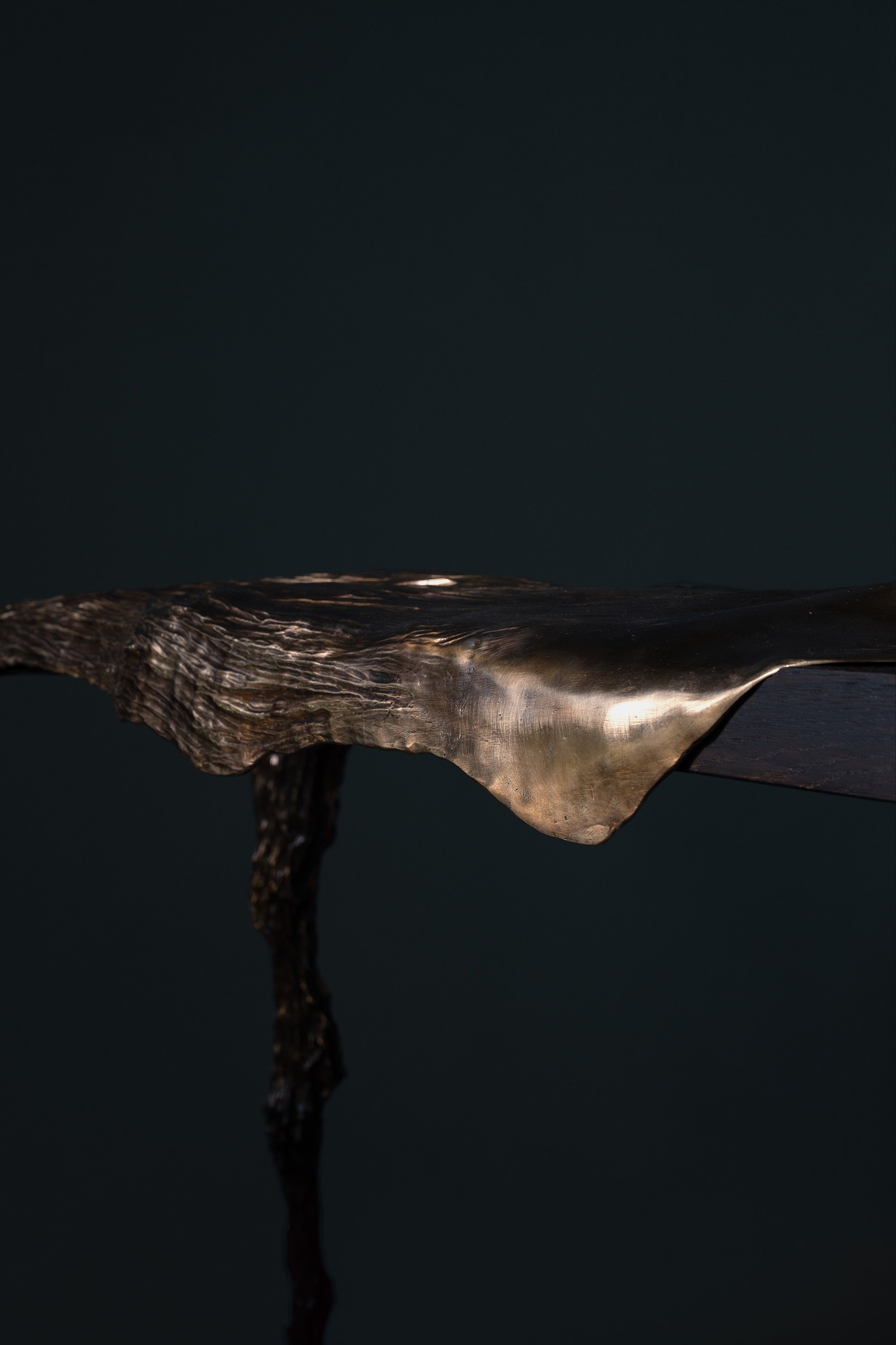 Close view of Every Breaking Wave Console bronze surface, highlighting artisanal patina, depth and subtle variations produced through lost-wax casting, making each collectible design entirely unique.