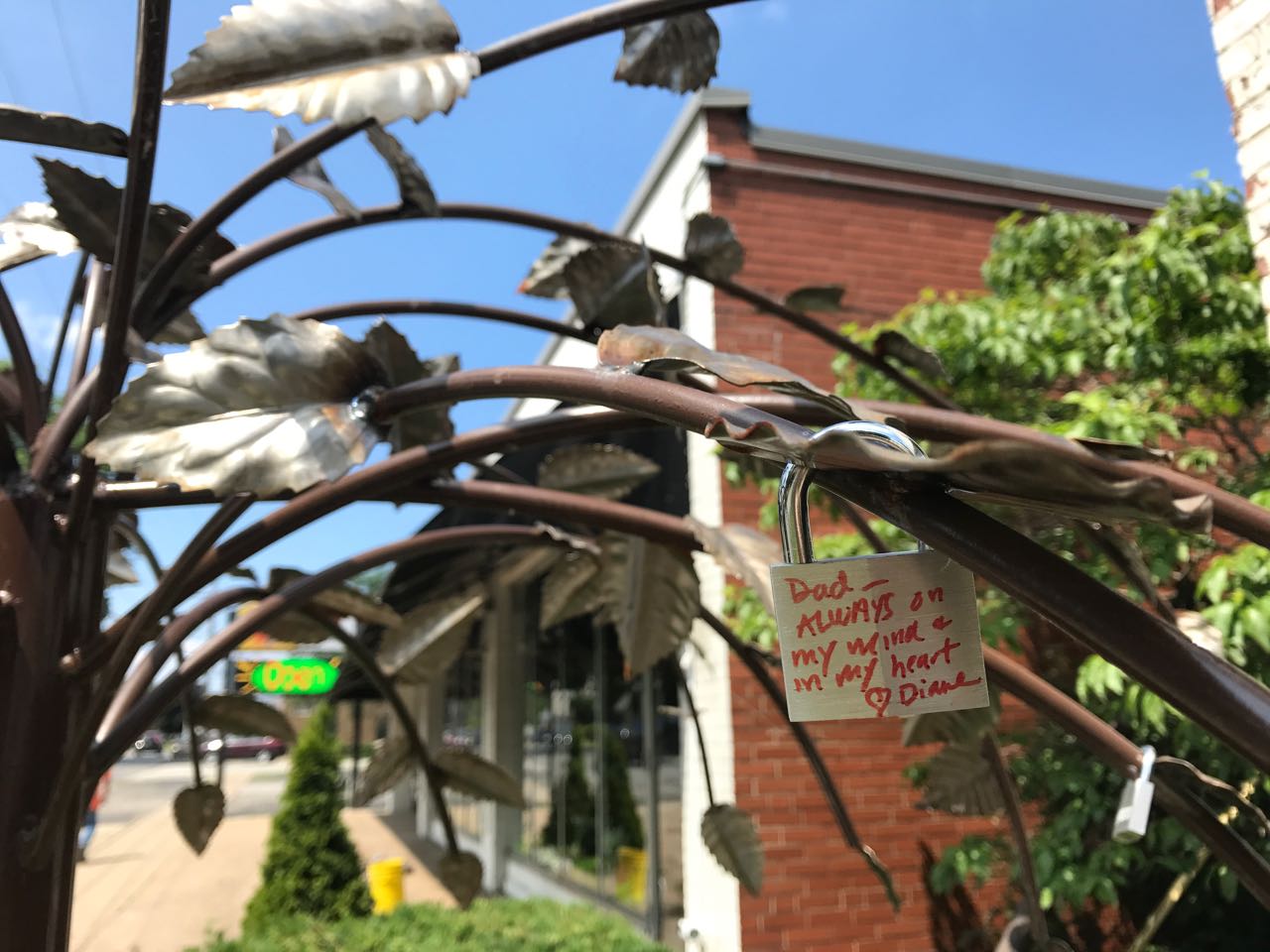 Place a lock on the tree to remember a special person, moment, or event in your life!