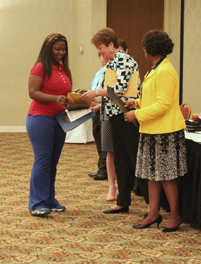 Danasjia Horsley accepts the first-ever GoodGuides Mentee of the Year Award.