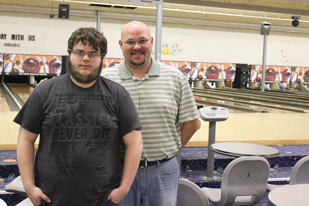 Tristan Cox with manager Craig Porter at Tristan's new job at the Oak Ridge Bowling Center.