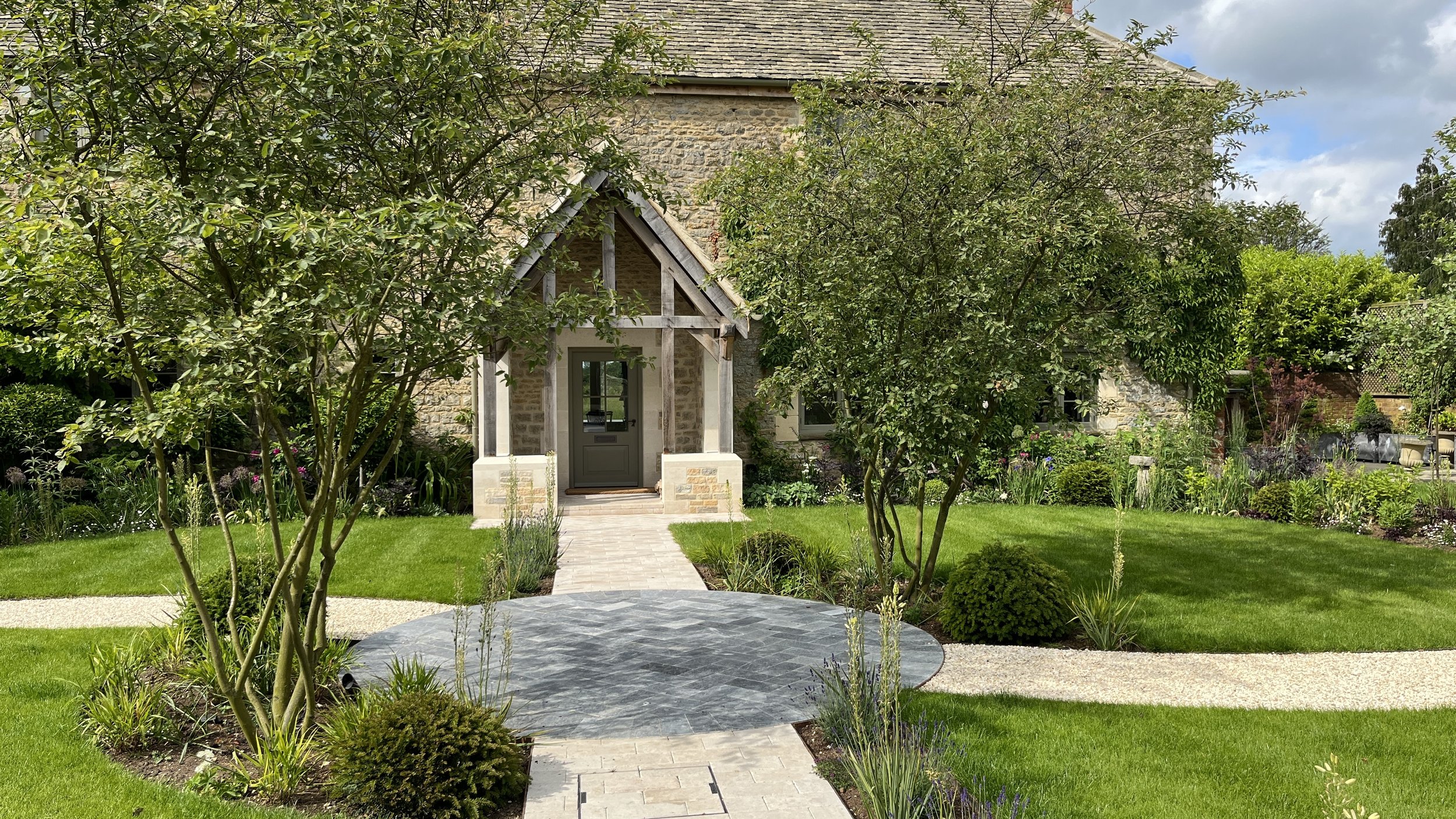 Entrance garden multi stem trees topiary planting garden path