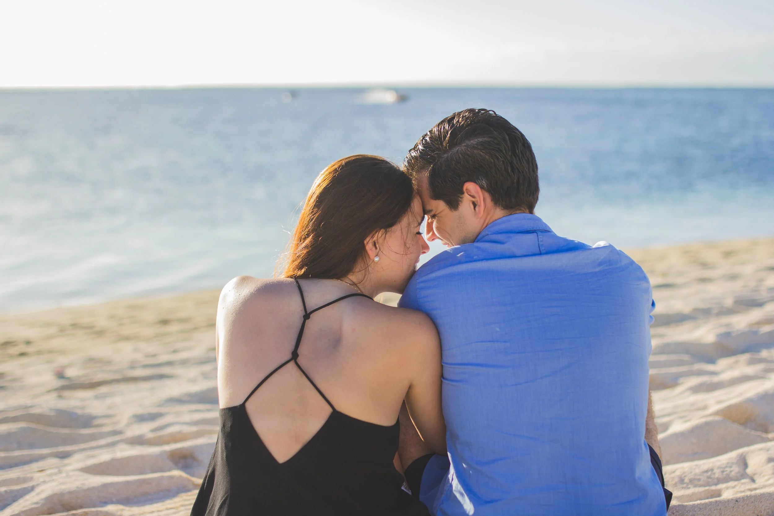 Couple facing the sea at St Regis hotel in Mauritius