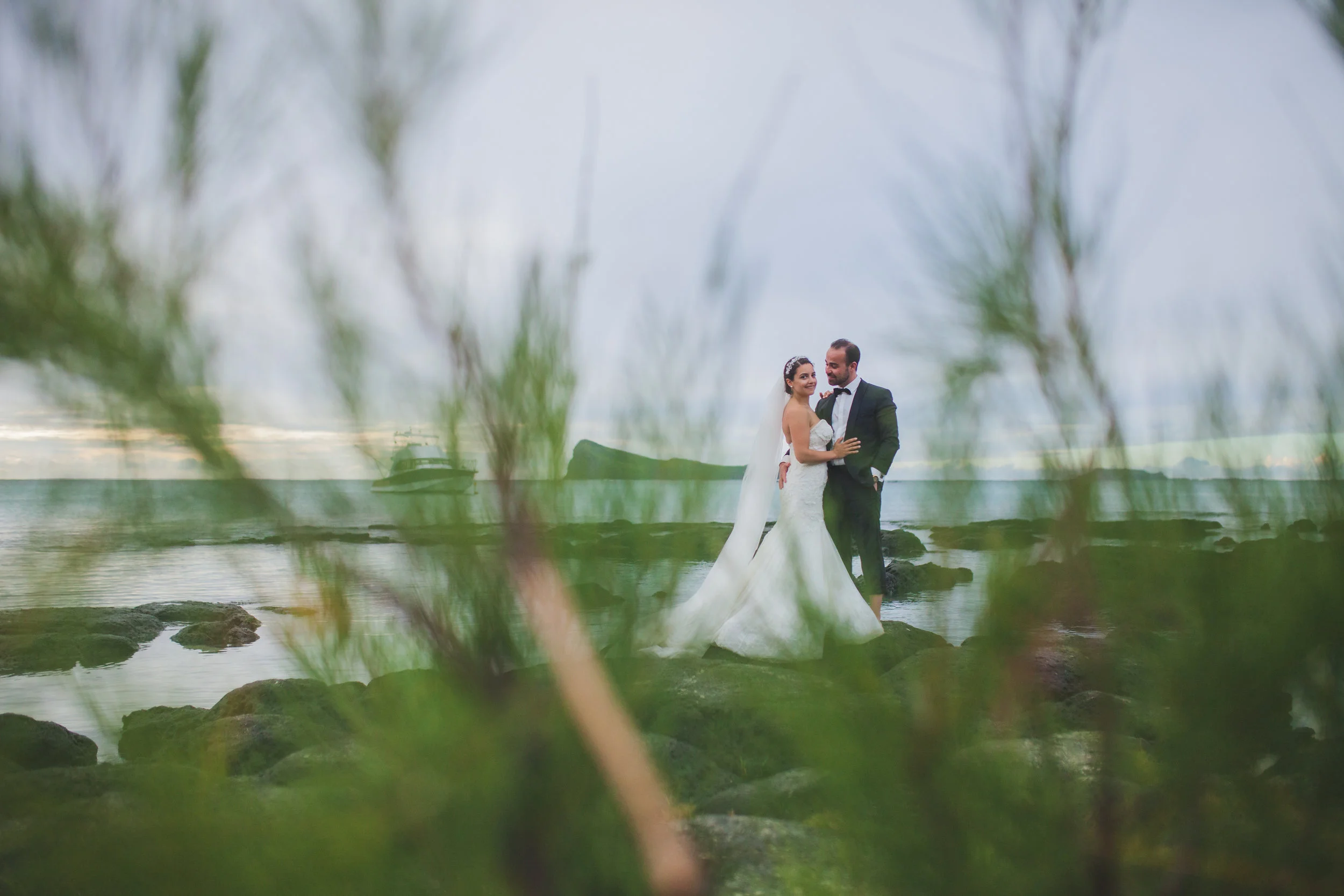 Groom looking at bride at Cap Malheureux