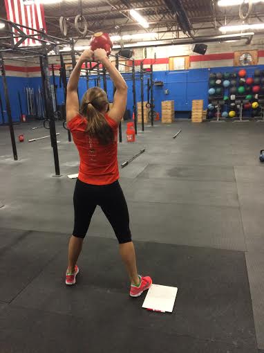 Michele had to do kettlebell swings alone because she finished her run so fast. 1:41!