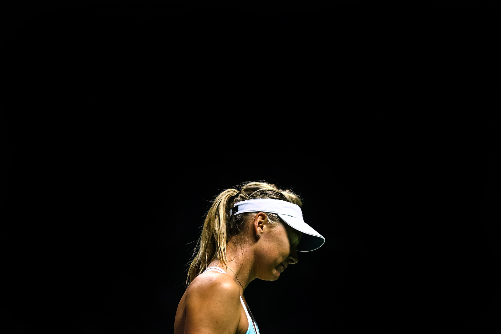 Maria Sharapova of Russia reacts during her singles match against Agnieszka Radwanska of Poland during the BNP Paribas WTA Finals at the OCBC Arena on October 25, 2015 in Singapore.