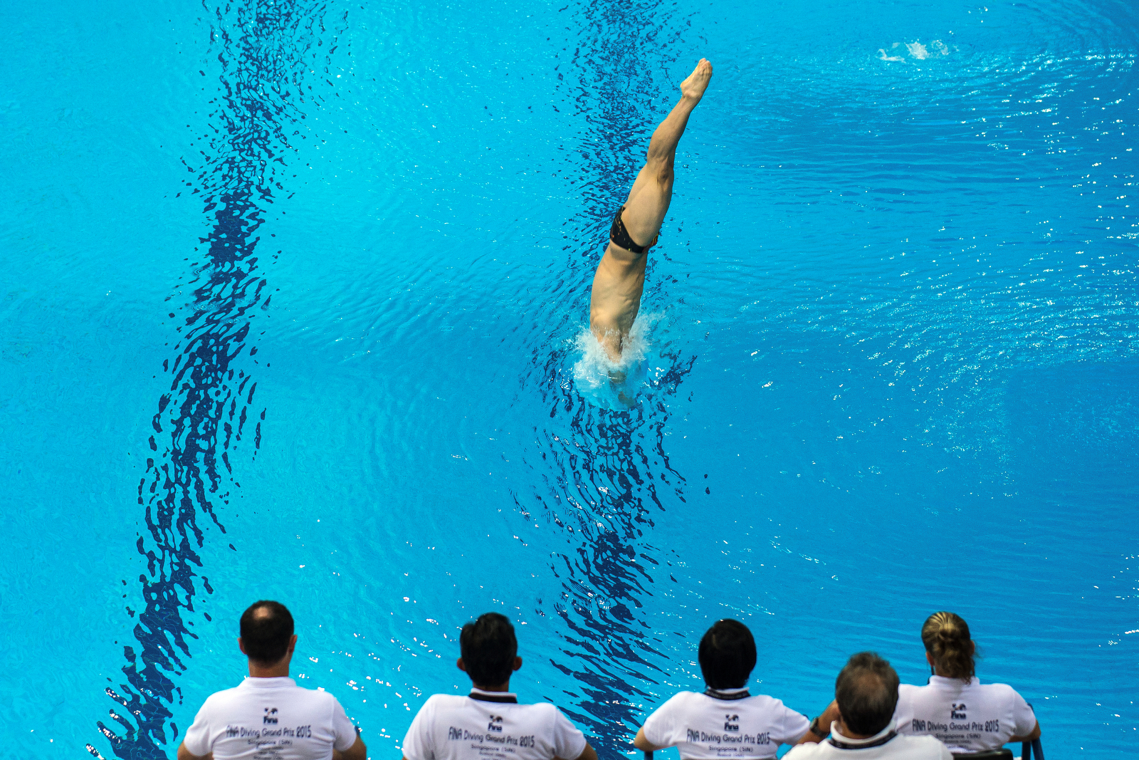 Peng Jian Feng of China in action during the men's 3m preliminaries on day one of the FINA Diving Grand Prix 2015 at the OCBC Aquatic Centre on October 16, 2015 in Singapore.