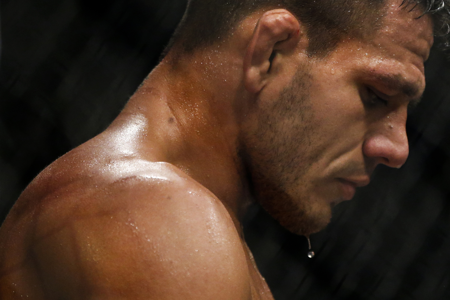 Rafael dos Anjos of Brazil takes a break during welterweight bout against Tarec Saffiedine of Belgium during the UFC Fight Night at the Singapore Indoor Stadium on June 17, 2017.