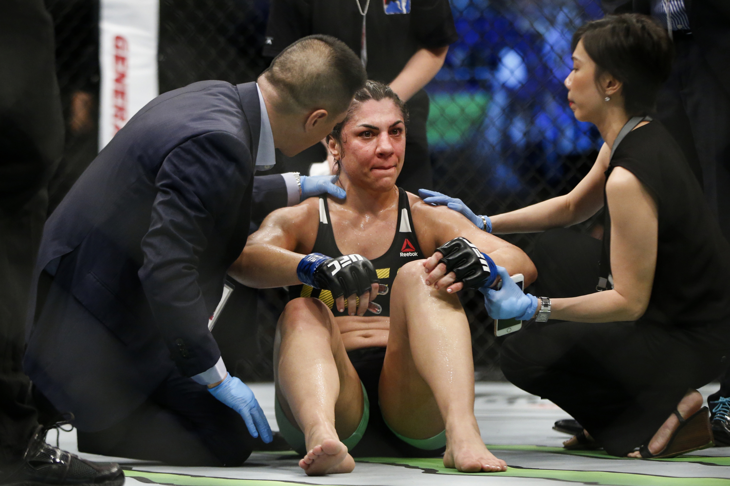  Bethe Correia of Brazil reacts after her bantamweight bout loss to Holly Holm of the United States during the UFC Fight Night at the Singapore Indoor Stadium on June 17, 2017. 
