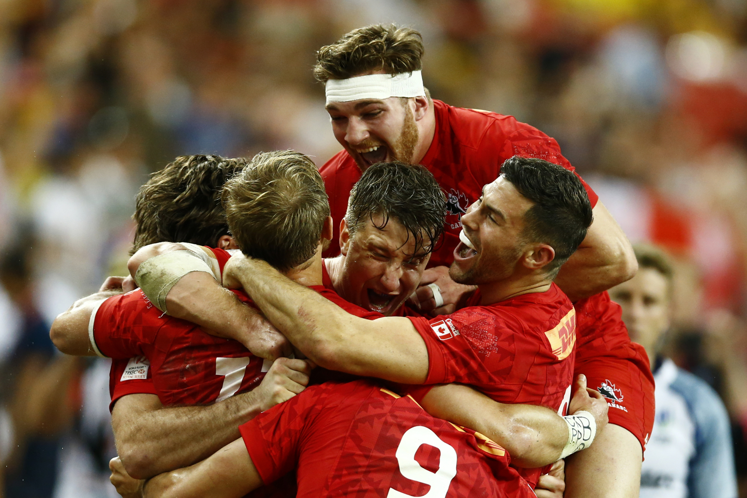  Rugby Union - Singapore Sevens Final - National Stadium, Singapore - 16/04/17 - Canada players celebrate their victory. REUTERS/Yong Teck Lim 