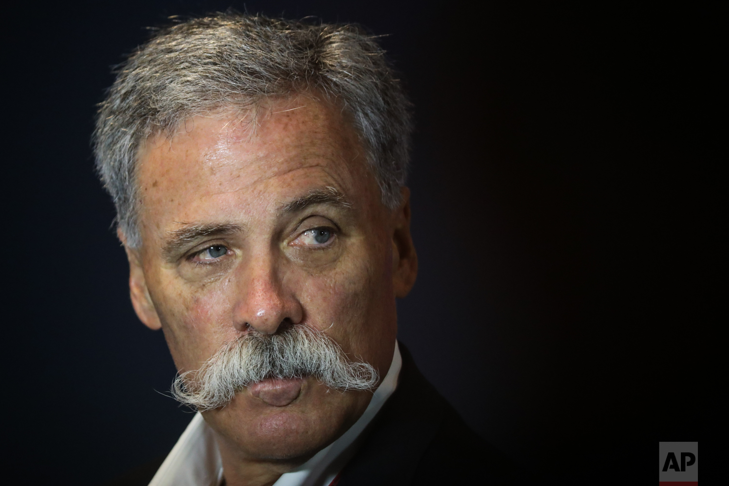  F1 President Chase Carey waits for the start of a press conference at the Marina Bay City Circuit ahead of the Singapore Formula One Grand Prix in Singapore on Friday, Sept. 15, 2017. (AP Photo/Yong Teck Lim) 