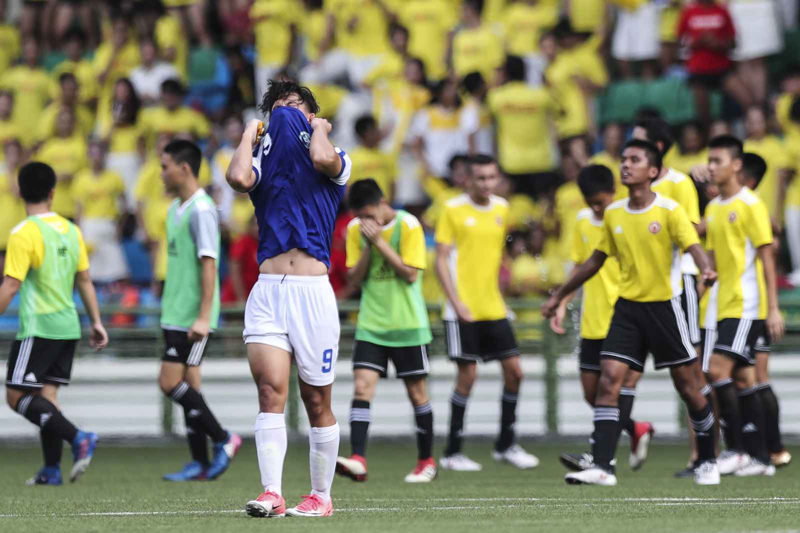 Nathanael Chin of Meridian Junior College reacts after his team's loss to Victoria Junior College during the National Schools boys’ ‘A' Division football final at Jalan Besar Stadium on May 14, 2018 in Singapore. (Photo © Yong Teck Lim/Red Sports)