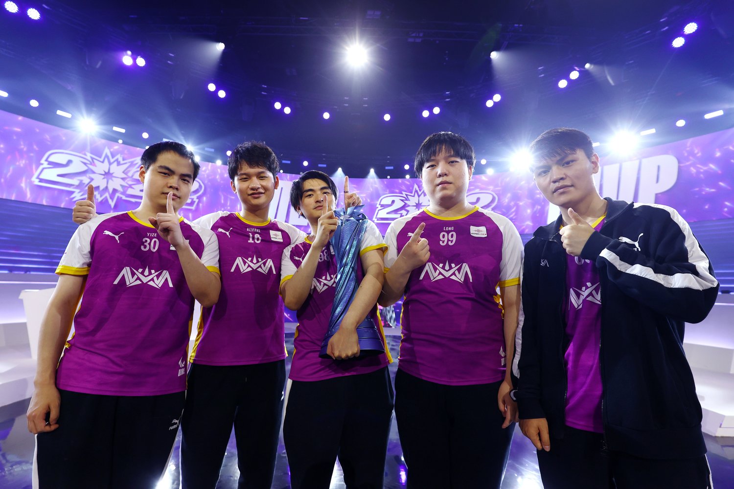  SINGAPORE, SINGAPORE - JULY 09: Nova Esports celebrate with the trophy after defeating J Team in the finals of the 2022 Wild Rift Icons Global Championship at Suntec Singapore International Convention & Exhibition Centre on July 09, 2022 in Singapor