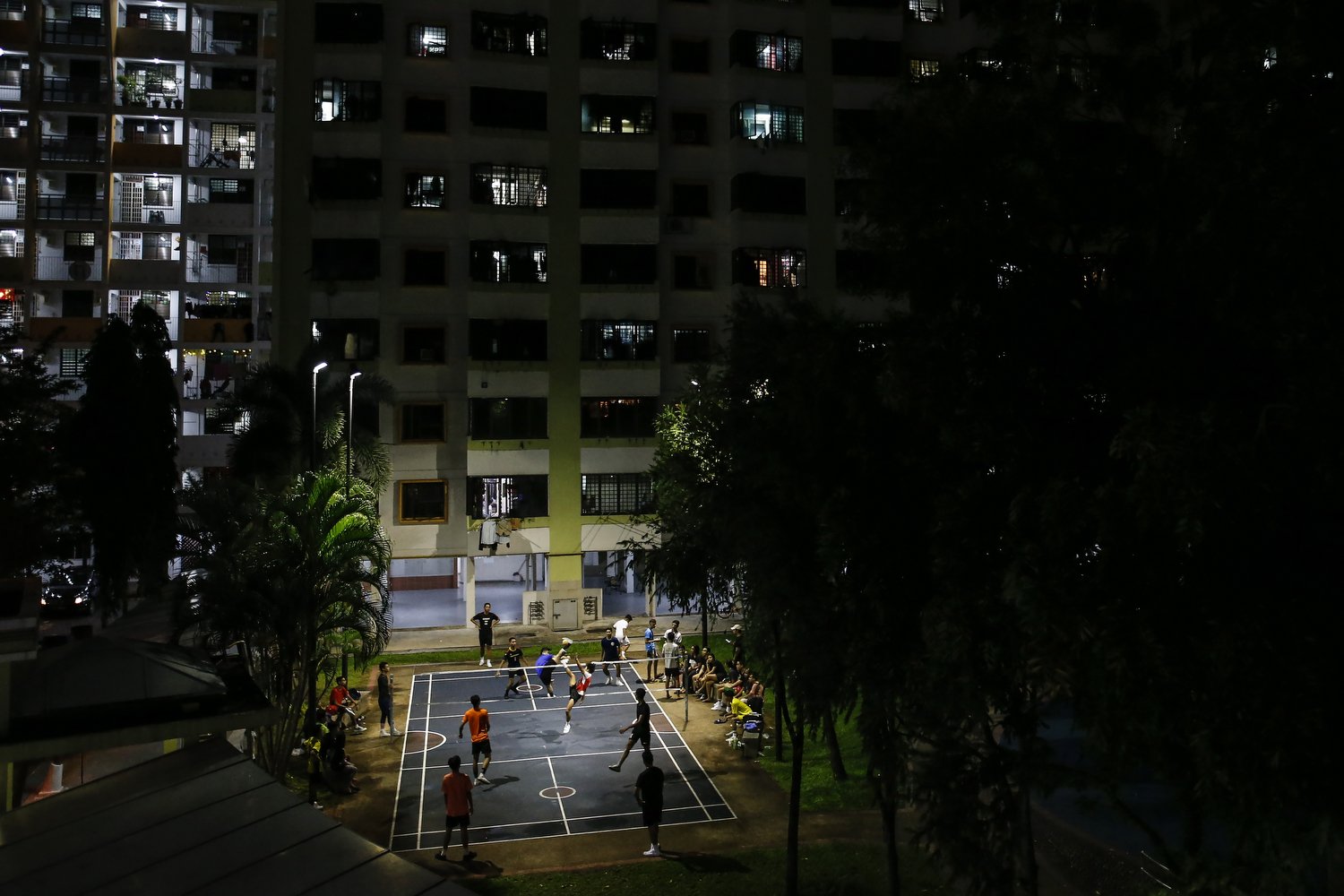  Youths play a game of sepak takraw at a community court on May 29. 2018 in Singapore. 