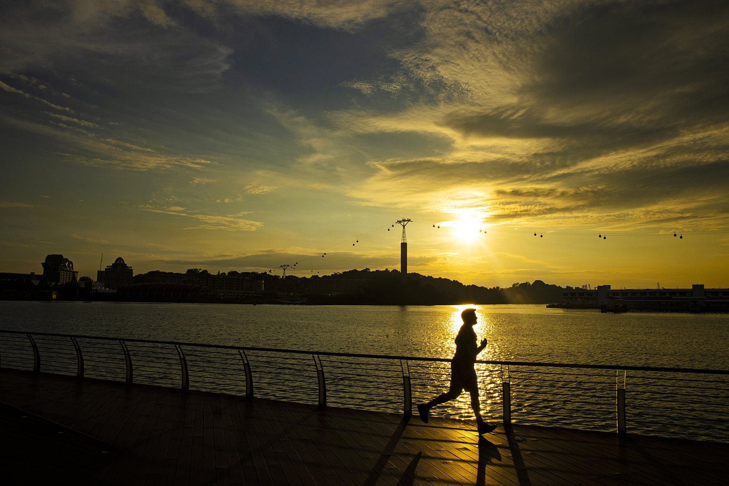  A man runs along the Sentosa Boardwalk on December 23, 2020 in Singapore. 