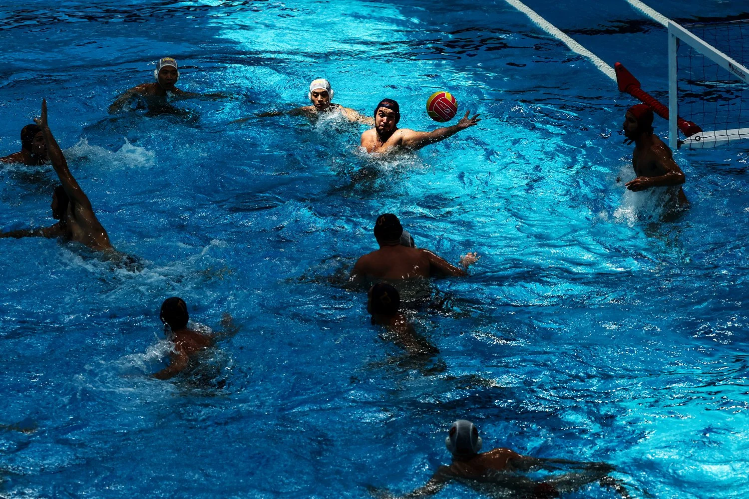  SINGAPORE, SINGAPORE - JULY 16: Savo Cetkovic of Team Montenegro catches a pass in the Preliminary Round Men's Water Polo match between Team China and Team Montenegro on day six of the Singapore 2025 World Aquatics Championships at OCBC Aquatic Cent