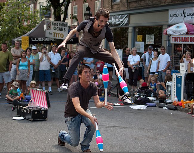 Performing tricks in the street for tips