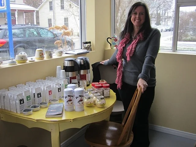 Gina showcasing some of her tea blends. 