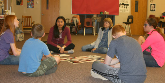 COMPAS teaching artist Saymoukda Vongsay works with students during a writing workshop in Kittson, MN
