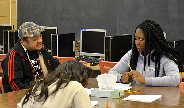 Spoken word artist, Tou Saiko Lee, generating ideas with students