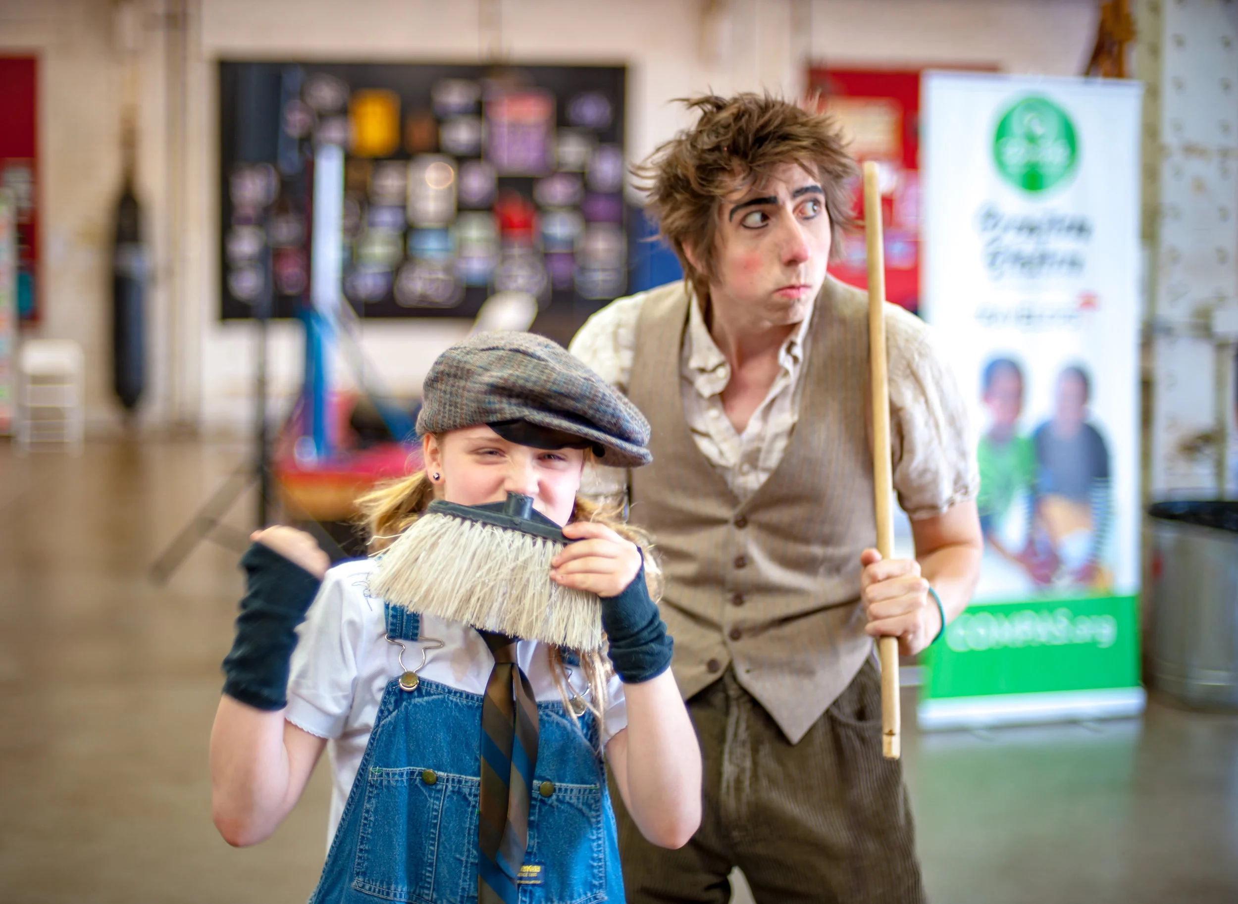 Benjamin and a young friend try our some clowning skills