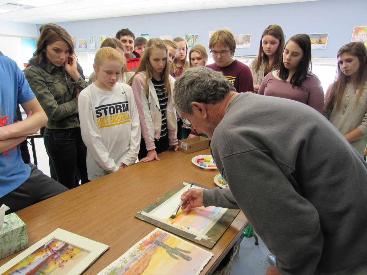 Jim Mondloch using watercolor with students