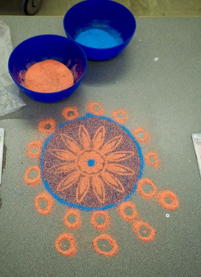 Students make sand art with Shakun