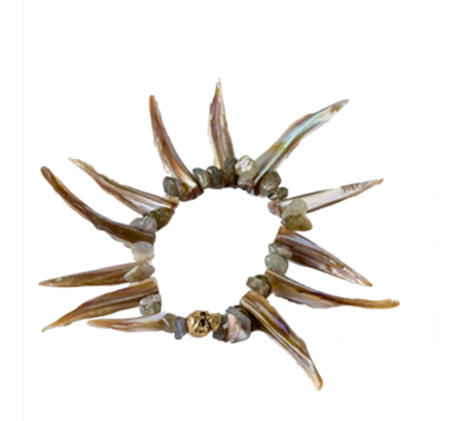 spikey+shell+cream,+gold+skull.jpg