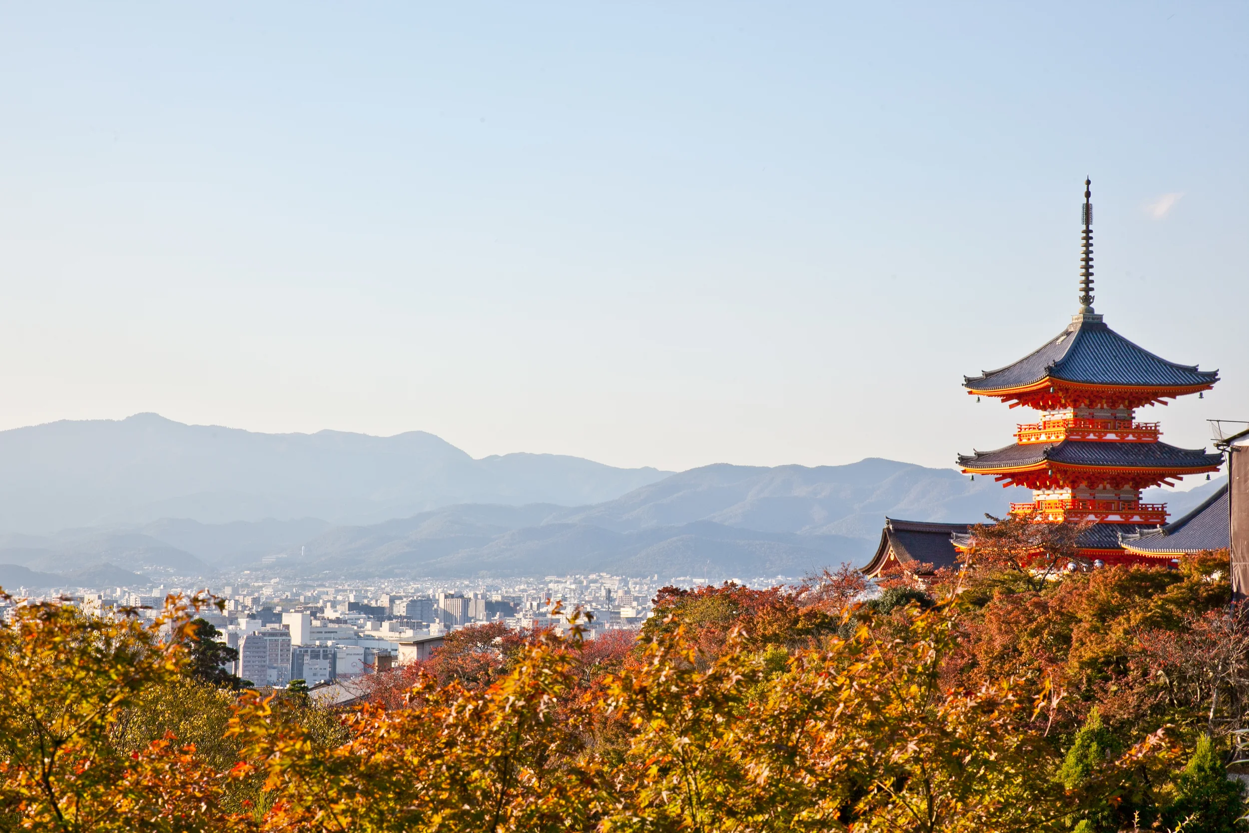 The temple has multiple areas, including a shrine and small waterfall, reachable by paths around the grounds
