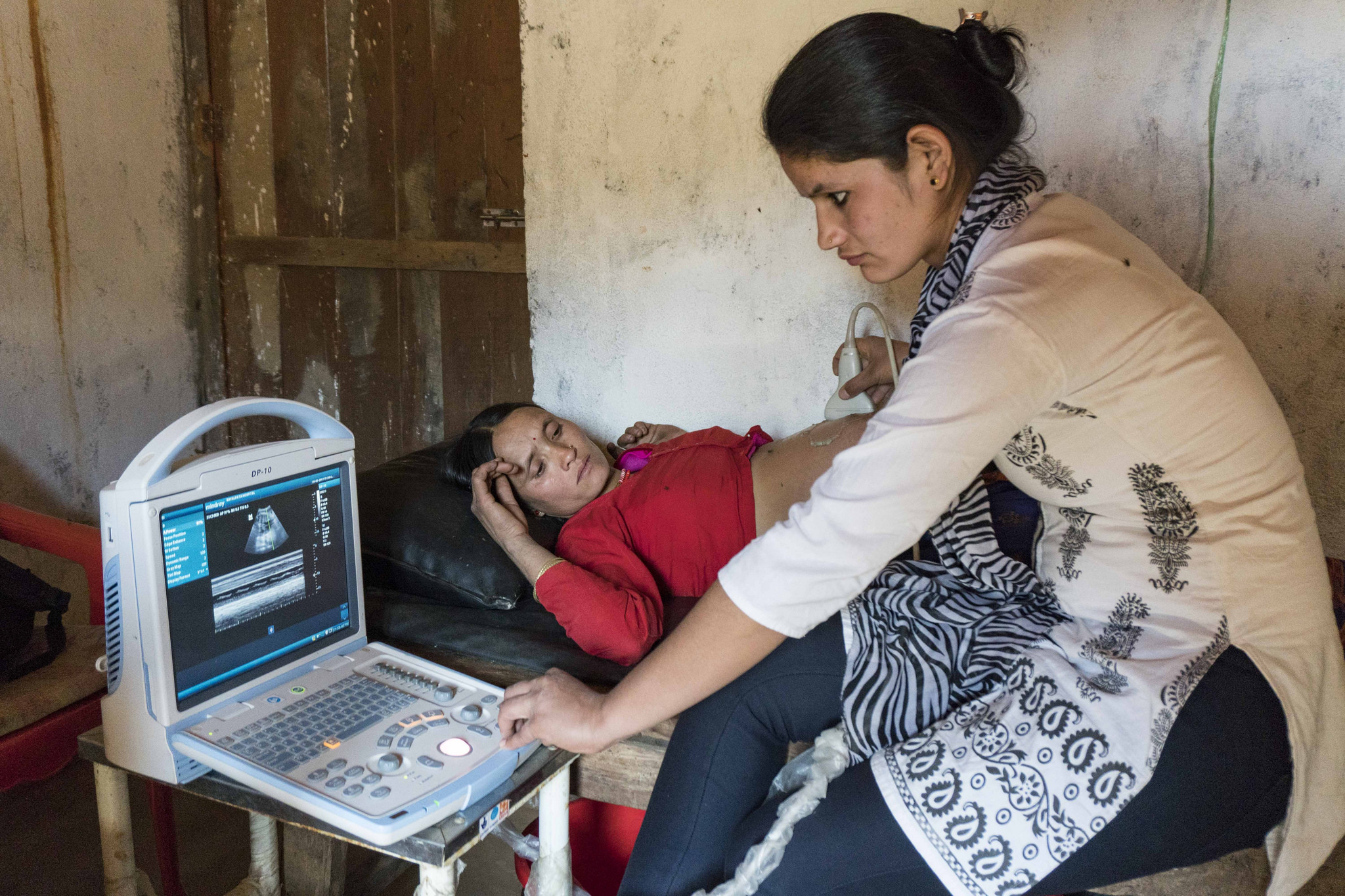 A patient gets an ultrasound at Lungra Health Clinic.