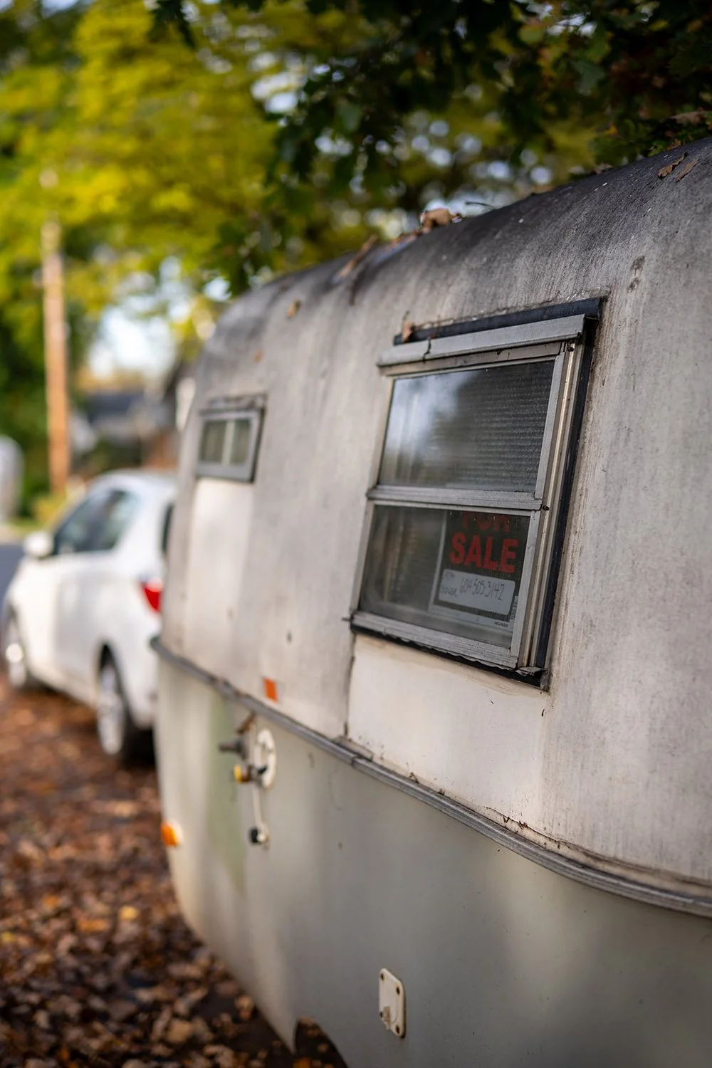 A camping trailer parked. Sample image from a Voigtländer Nokton 50mm f/1.2 Aspherical and Nikon Zf.