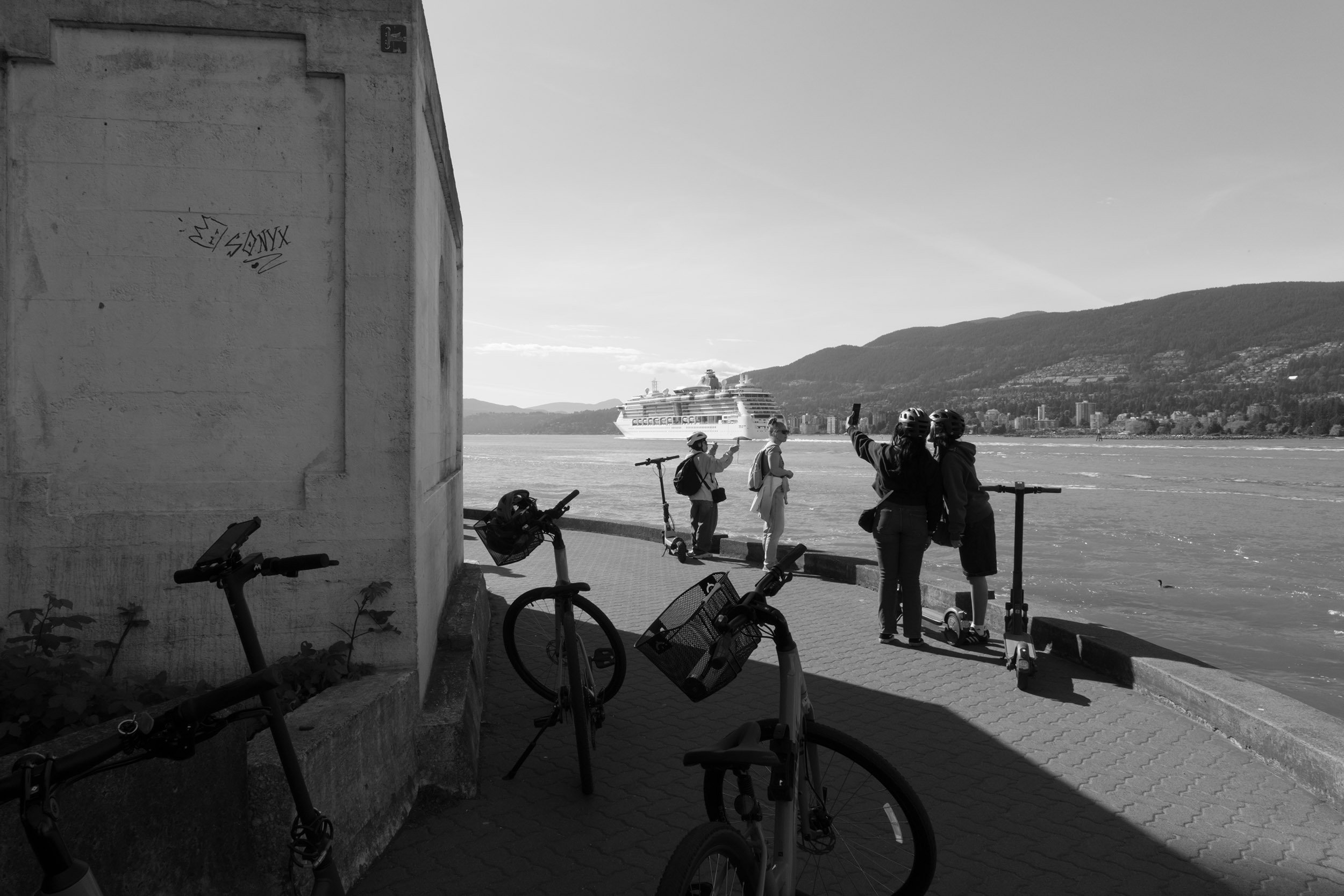 People take selfies at Prospect Point in Vancouver. Sample image from a Fujifilm X-T50 and XF 16-50mm f/2.8 R LM WR.