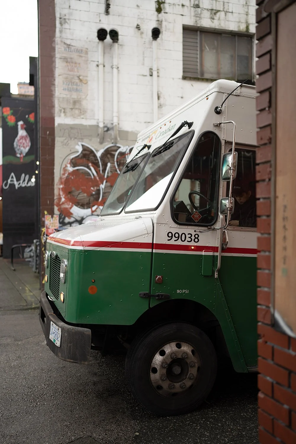 A delivery van parked in a Chinatown Alley in Vancouver. Sample image from a Sony A7 IV.
