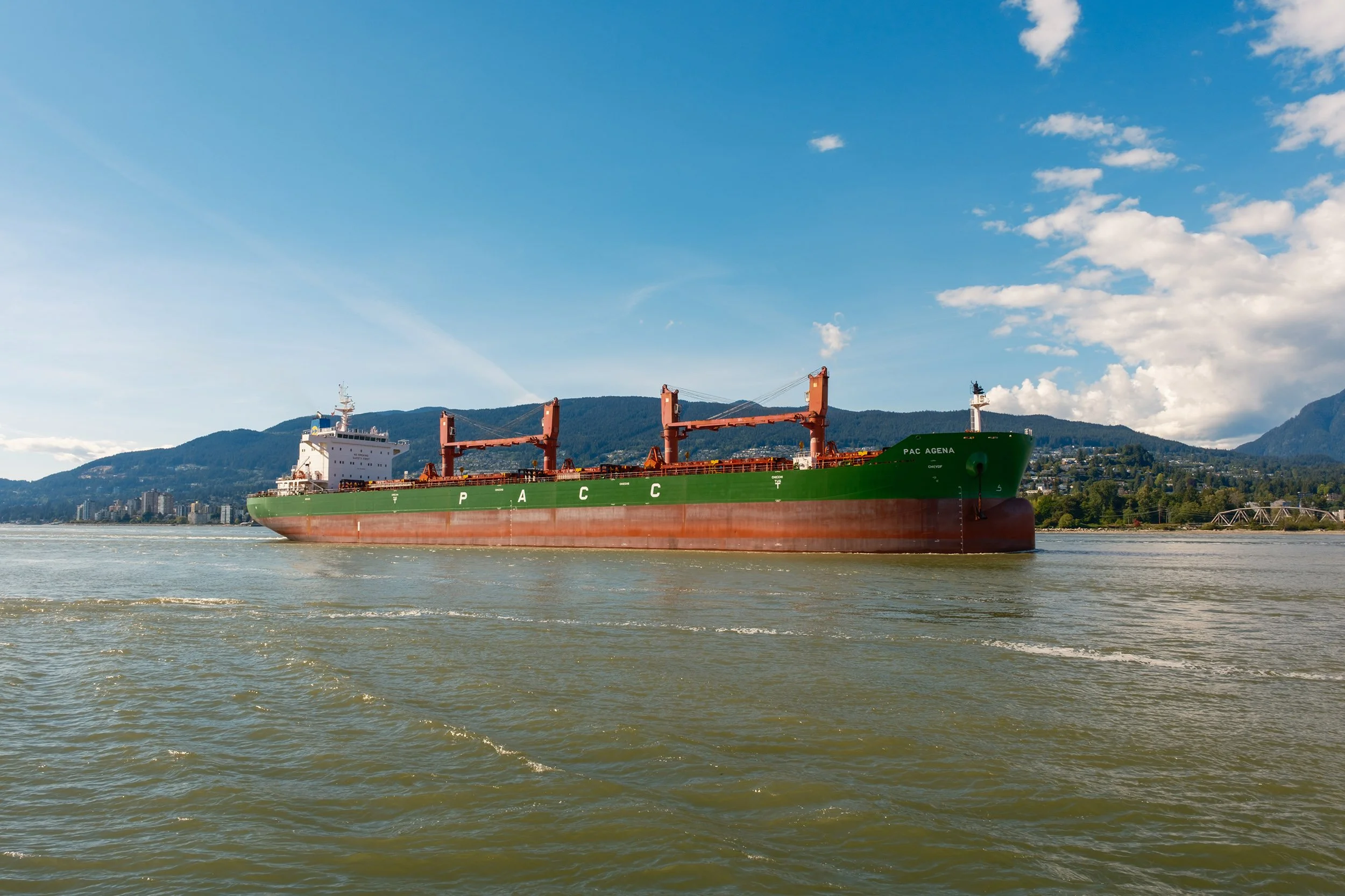 A cargo ship approaches the Lions Gate Bridge in Vancouver. Sample image from a Fujifilm X-T50 and XF 16-50mm f/2.8 R LM WR.