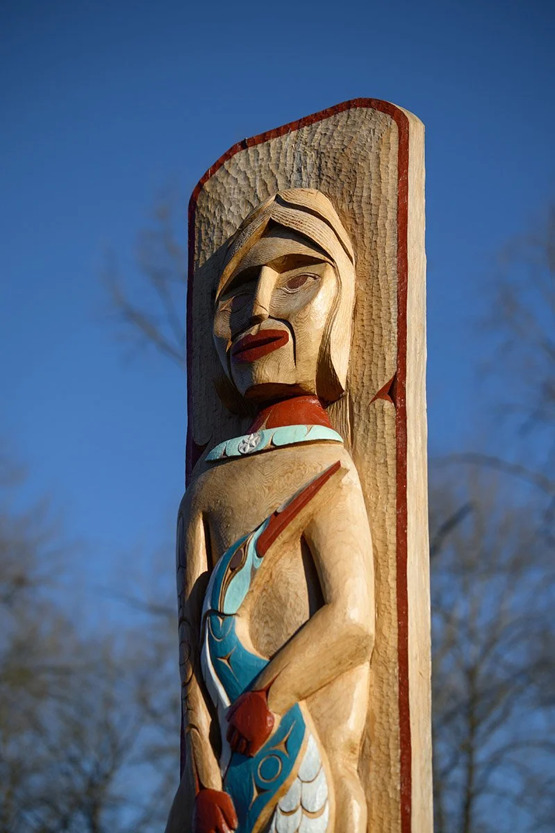 First Nations art in Port Moody. Tree and reflection, Coquitlam River. Sample image from a Viltrox 56mm f/1.2 Z (Nikon Z-Mount) and Nikon Z8.