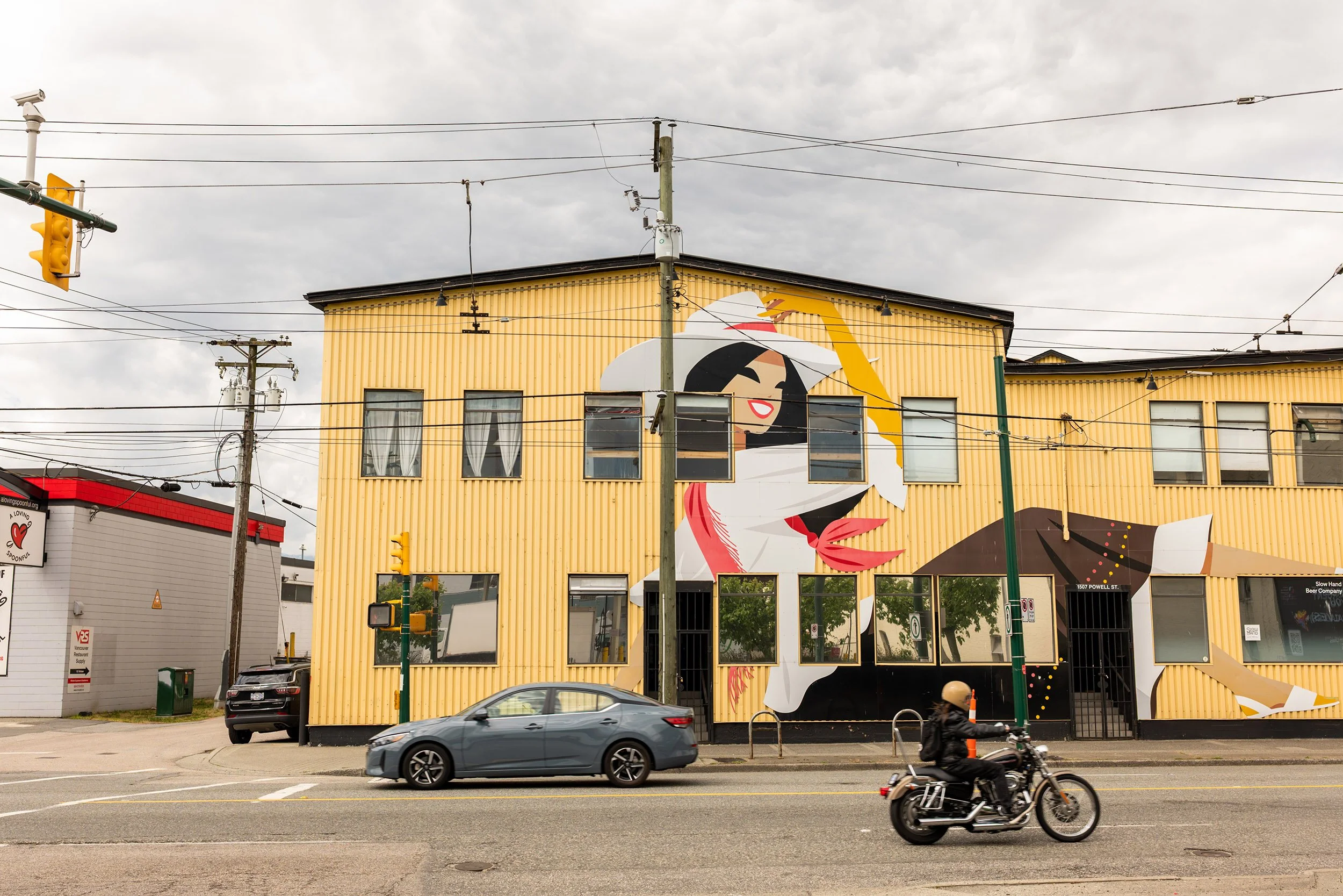 Cow girl mural in East Vancouver