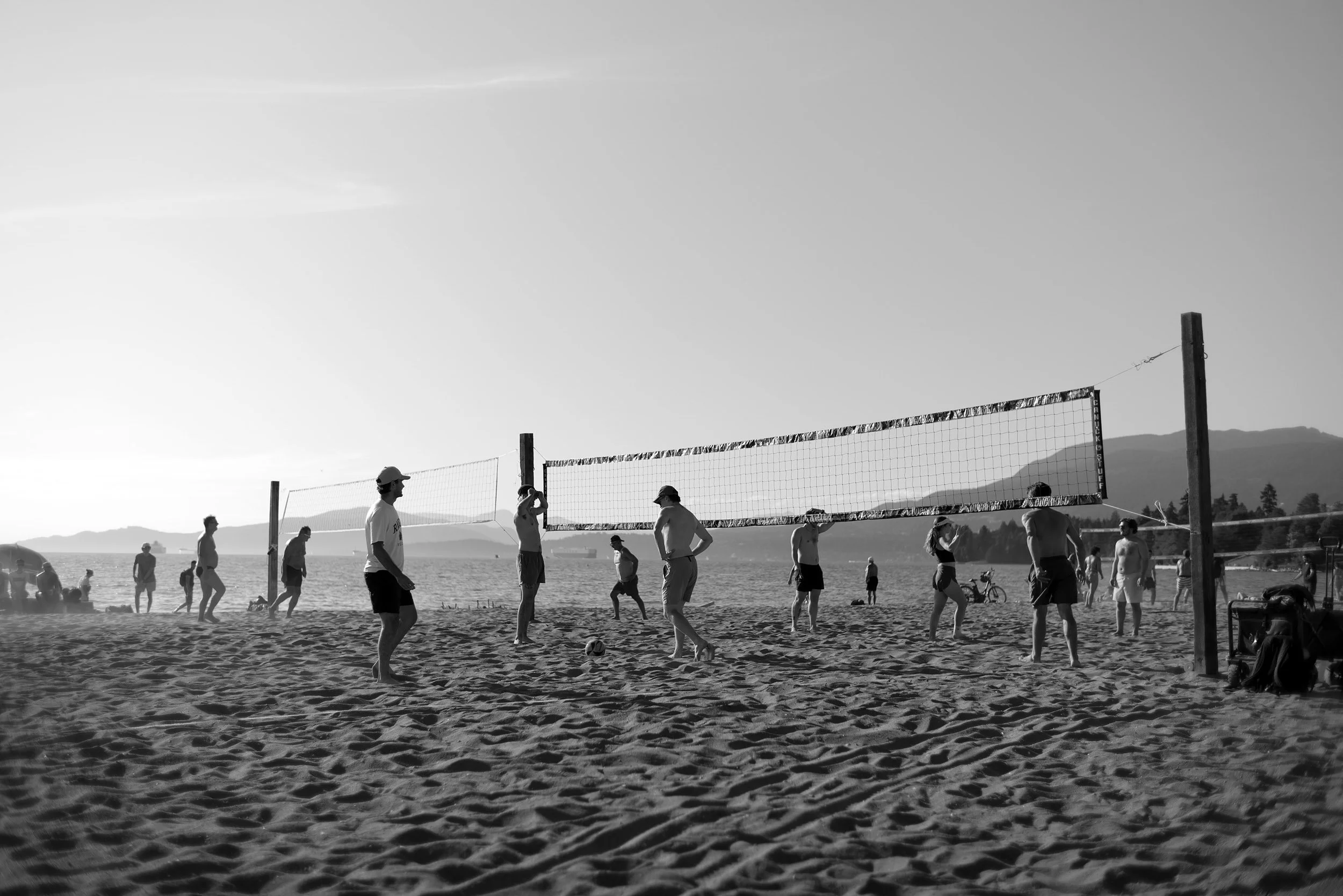 English Bay Beach volleyball. Sample image from a Voigtländer Nokton Classic 35mm f/1.4 II MC and Leica SL2-S.