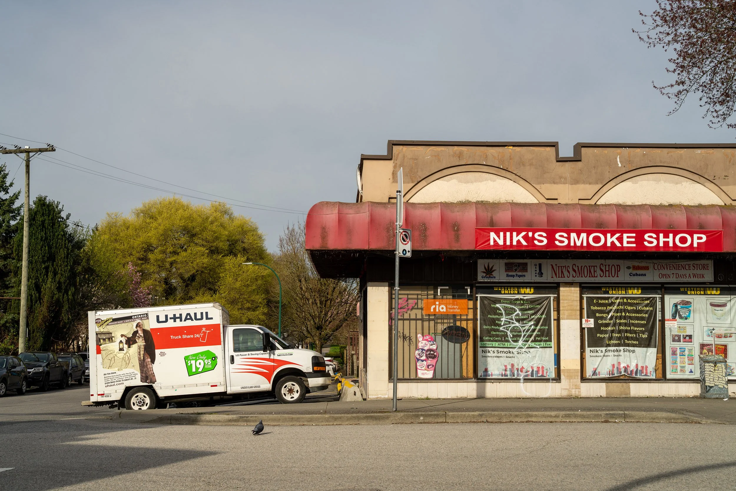 Nik's Smoke Shop, Kingsway, Vancouver. Sample image from a Sony A7R V and Sony FE 50mm f/1.4 GM.