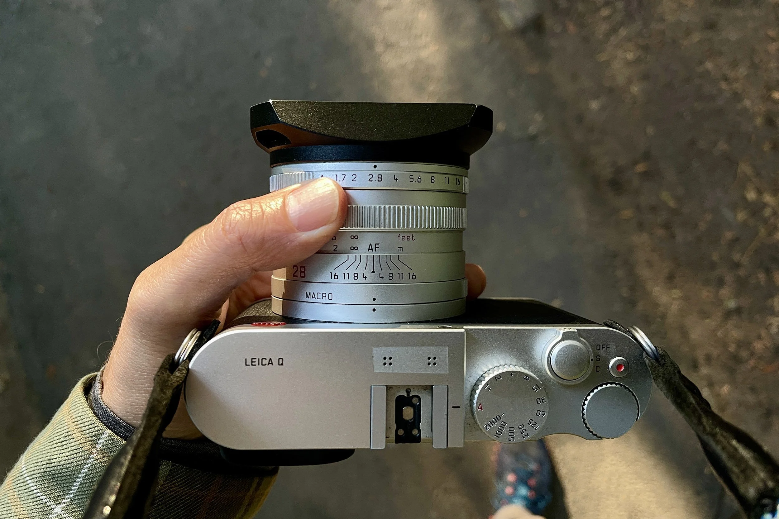 Leica Q Typ 116, silver, with an aftermarket black hood