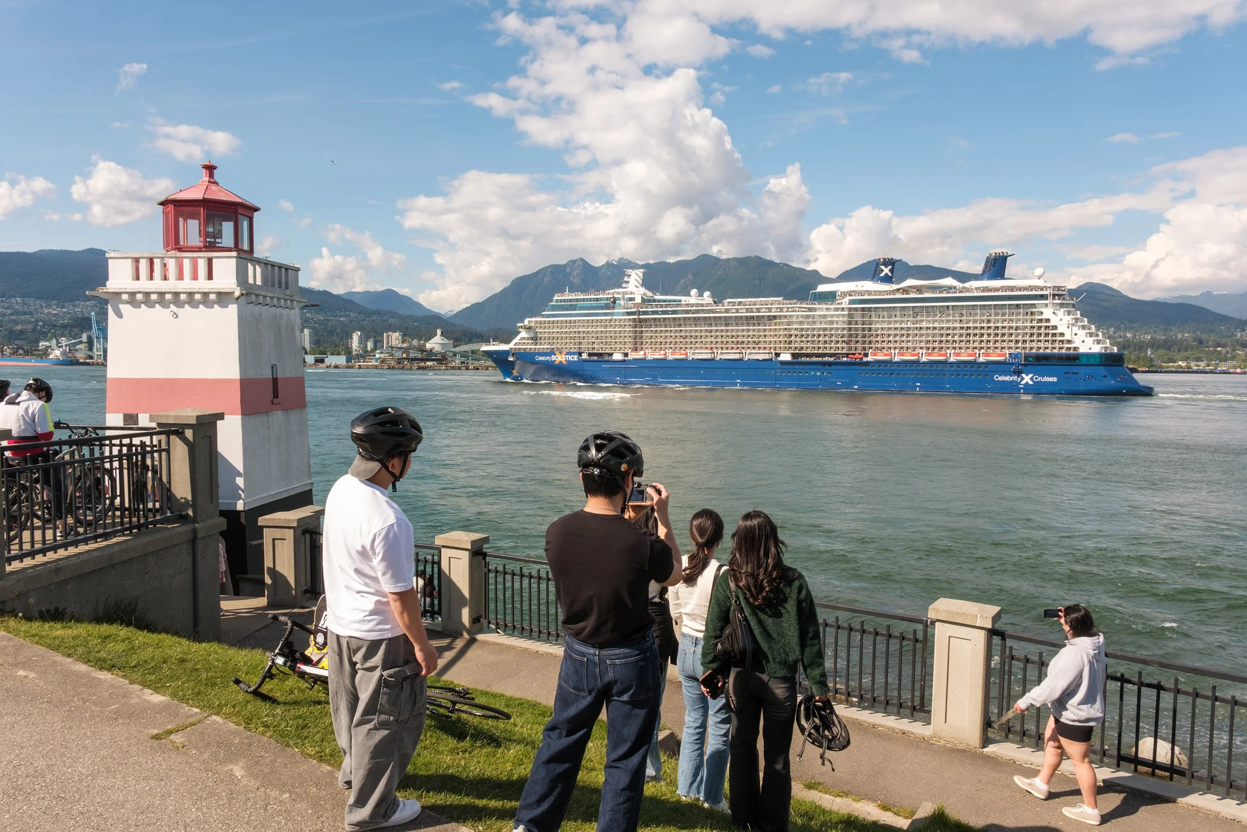 Departing from Vancouver a cruise ship sails by Brockton Point Lighthouse. Sample image from a Fujifilm X-T50 and XF 16-50mm f/2.8 R LM WR.