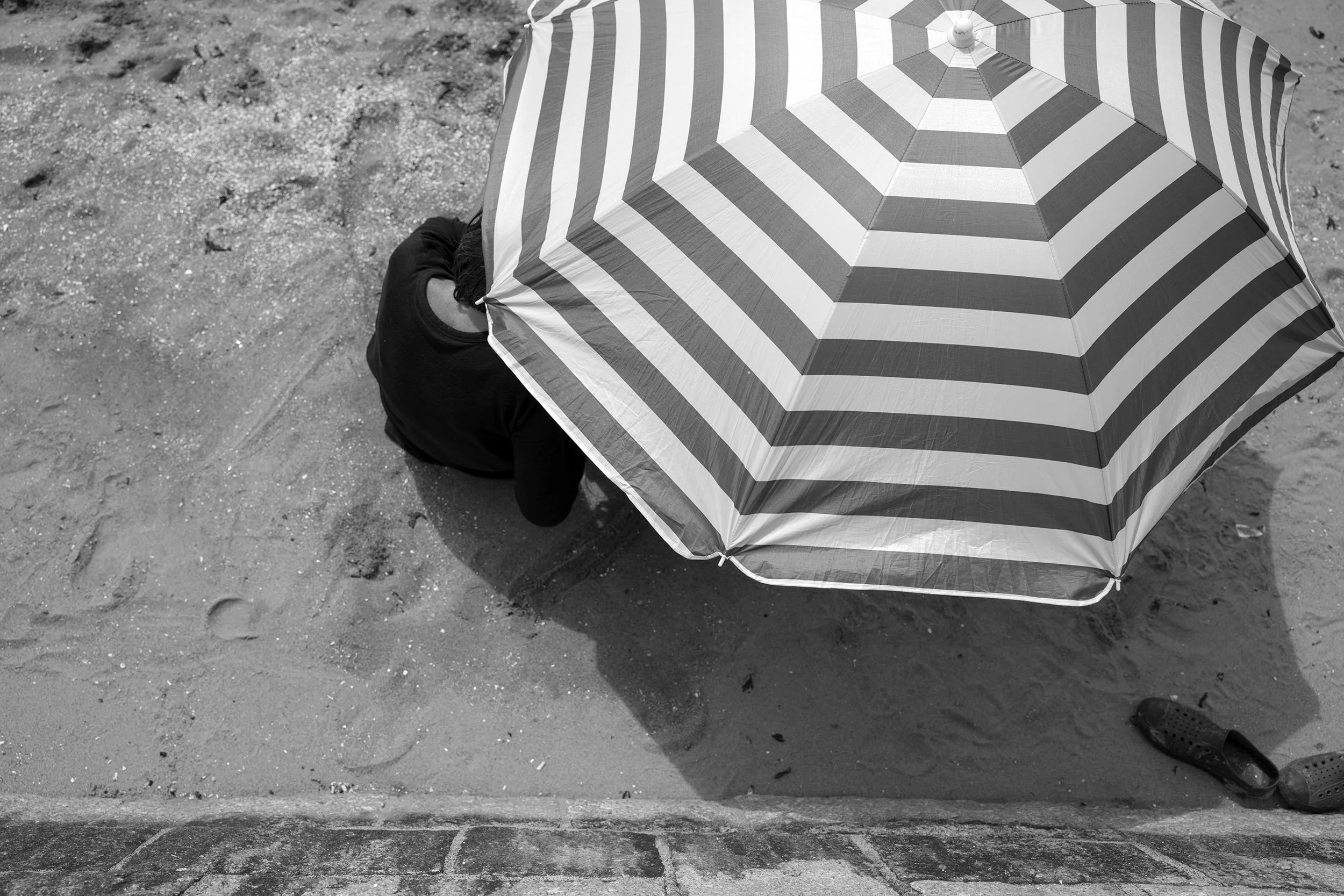 Sun umbrella at Second Beach in Vancouver, July 2026