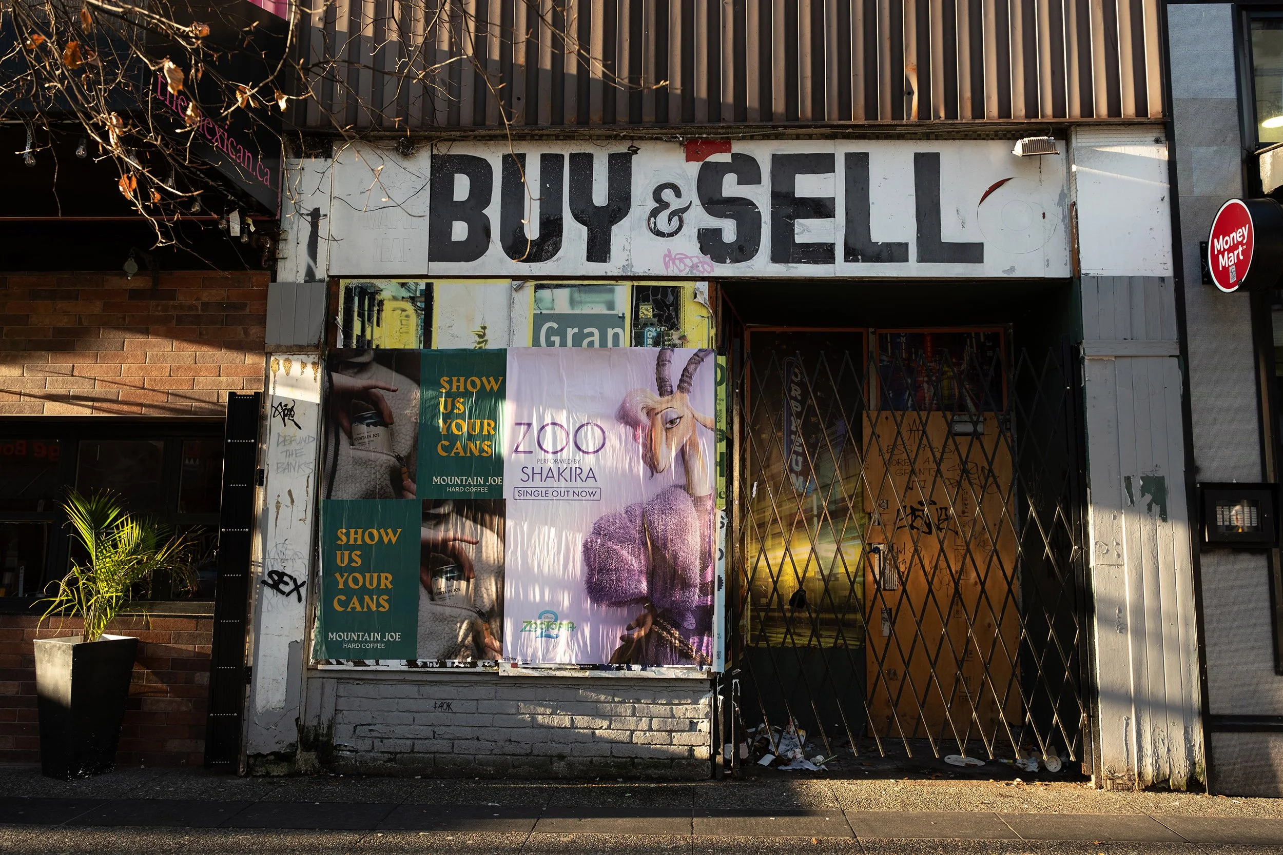 Buy and Sell store on Granville Street in Vancouver. Sample image from a Sigma 17-40mm f/1.8 DC Art and Fujifilm X-E5.