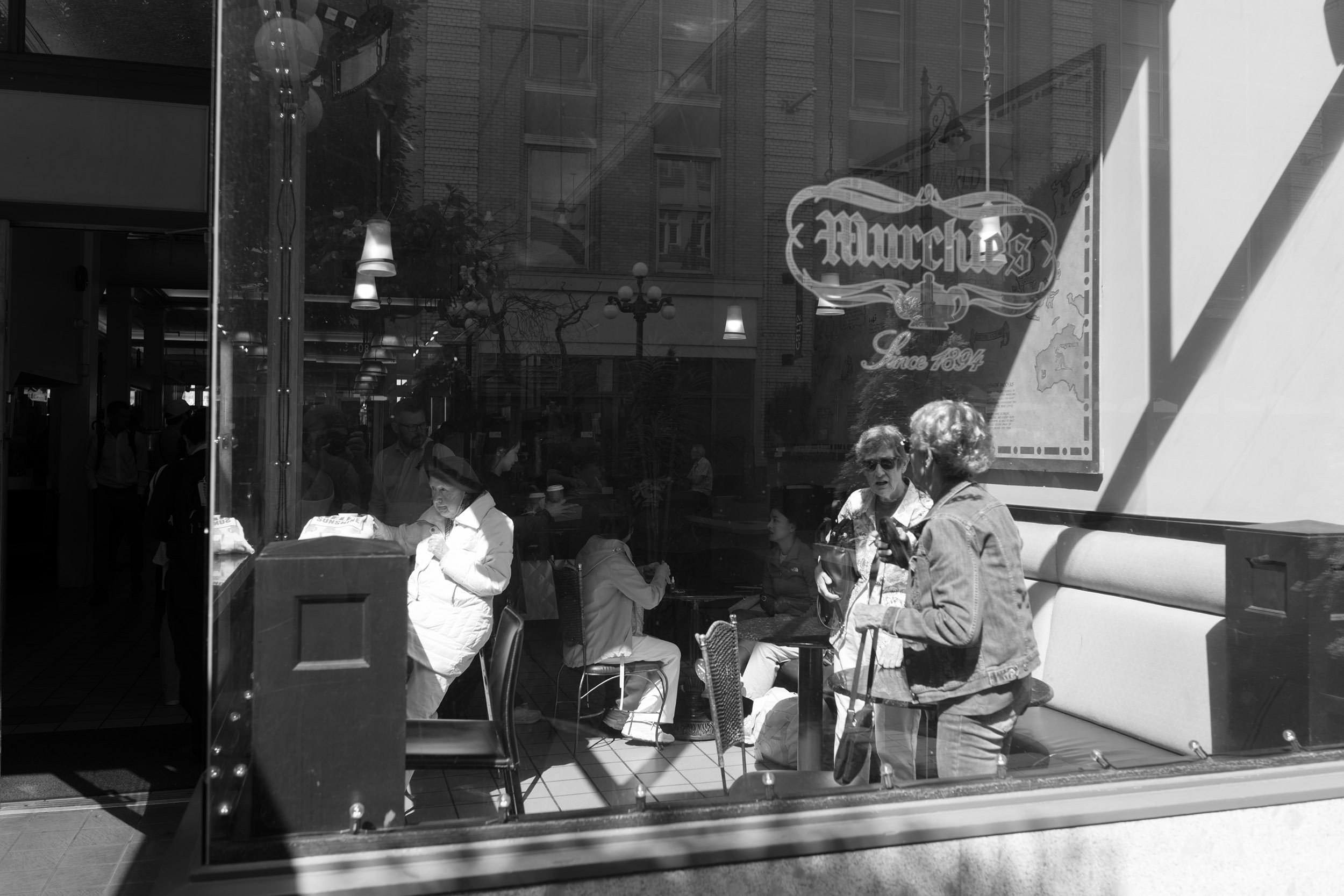 Ladies meet for coffee and cake at Murchie's in Victoria, BC, Canada